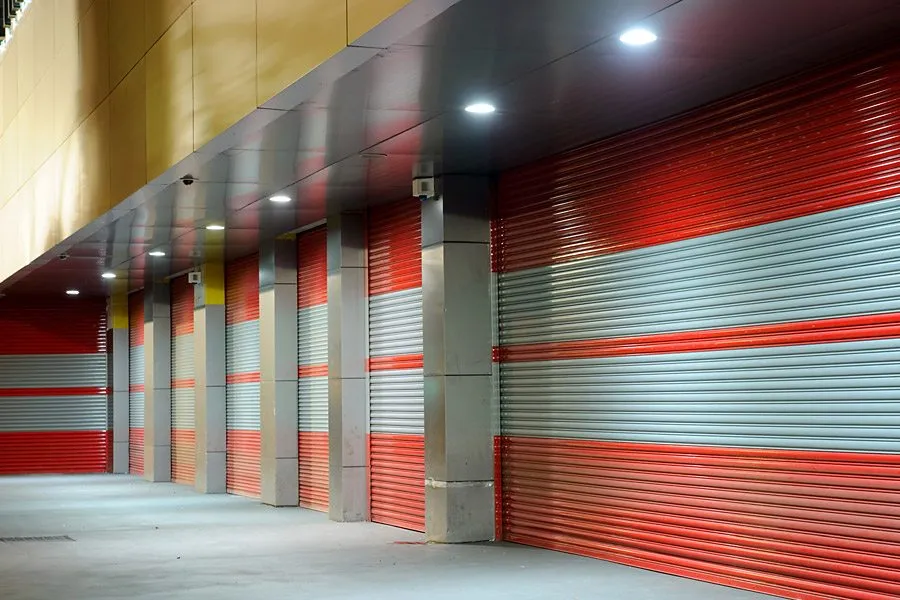 Red and grey fire rated roller shutter doors